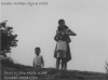 Korean kids flying a kite.