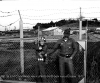 A1C John Hinds handcuffed to Sgt. Sa