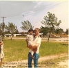 A1C Ross Nelson with girl from orphanage