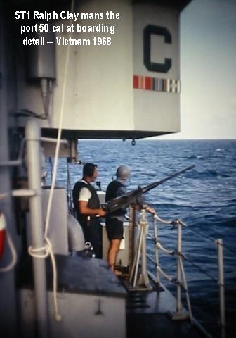 ST1 Ralph Clay readies the port .50 cal deck gun