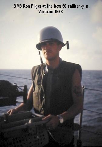 BM3 Ron Filger at the bow .50 cal deck gun