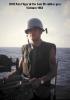 BM3 Ron Filger at the bow .50 cal deck gun