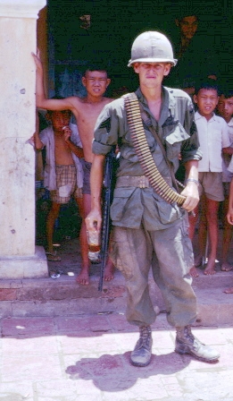 Ian in Tan An after sweeping the road to